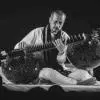 Baha'ud'din Mohiuddin Dagar plays rudra veena with the dagarbani style. 