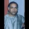 Vishwa Prakash is a harmonium player.