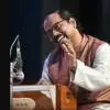Harmonium player Vyasmurti Katti performing during a Hindustani classical music concert.