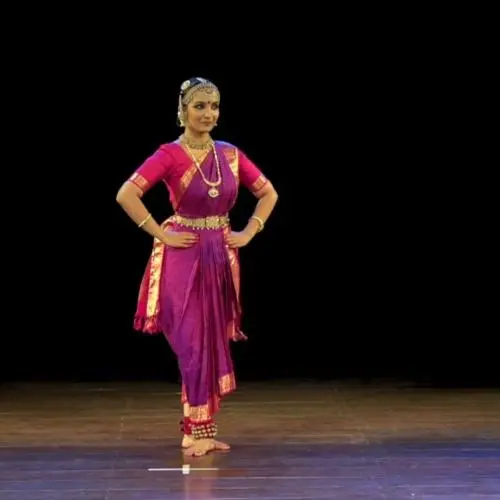 Shruti Gopal, Indian classical dancer, captured in a Bharatanatyam pose showcasing controlled movement and expressive abhinaya.