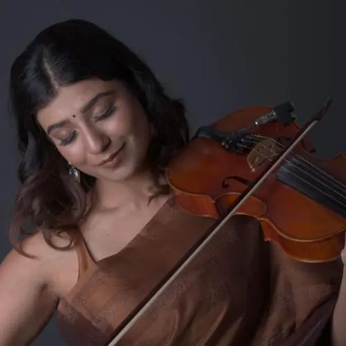 Apoorva Krishna is a Carnatic violinist. 