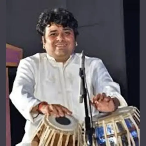 Charudatta Phadke is a tabla player.