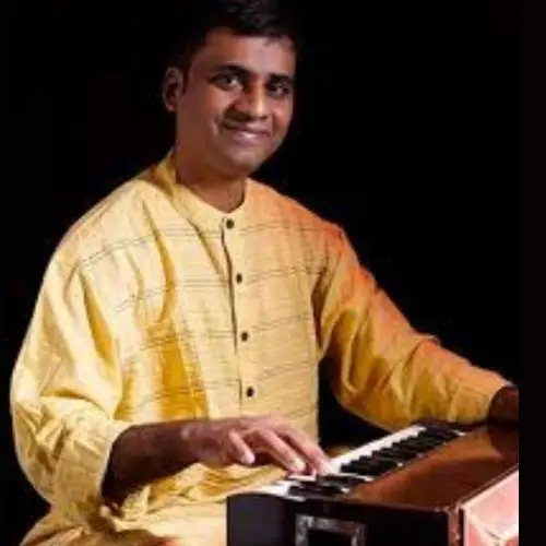 Siddhesh Bicholkar is a harmonium player.