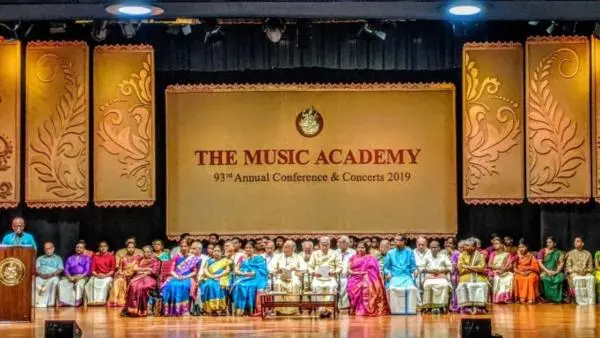 Stage view of The Music Academy’s 93rd Annual Conference and Concerts 2019 featuring artists and dignitaries seated during the Madras Music Season event.